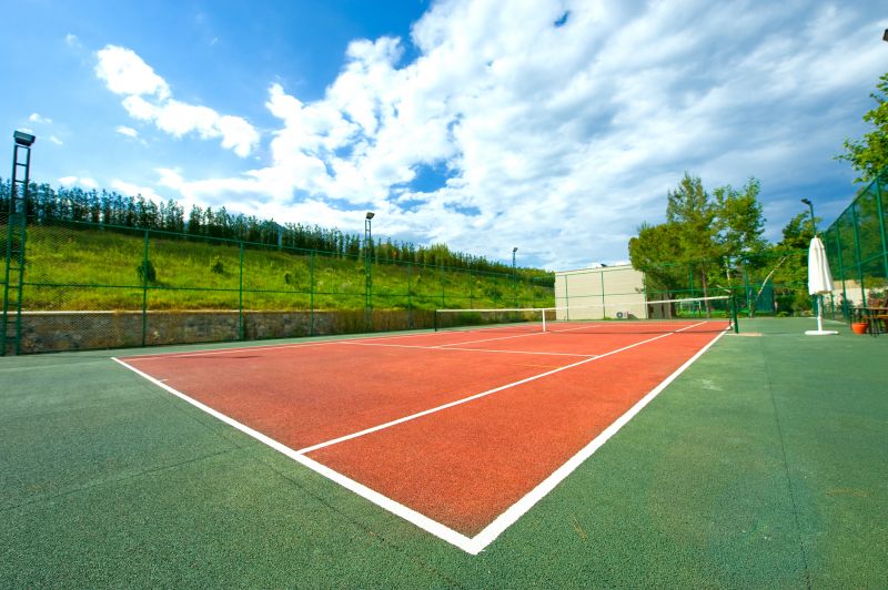 Local Tennis Court Refurbishing pros at work